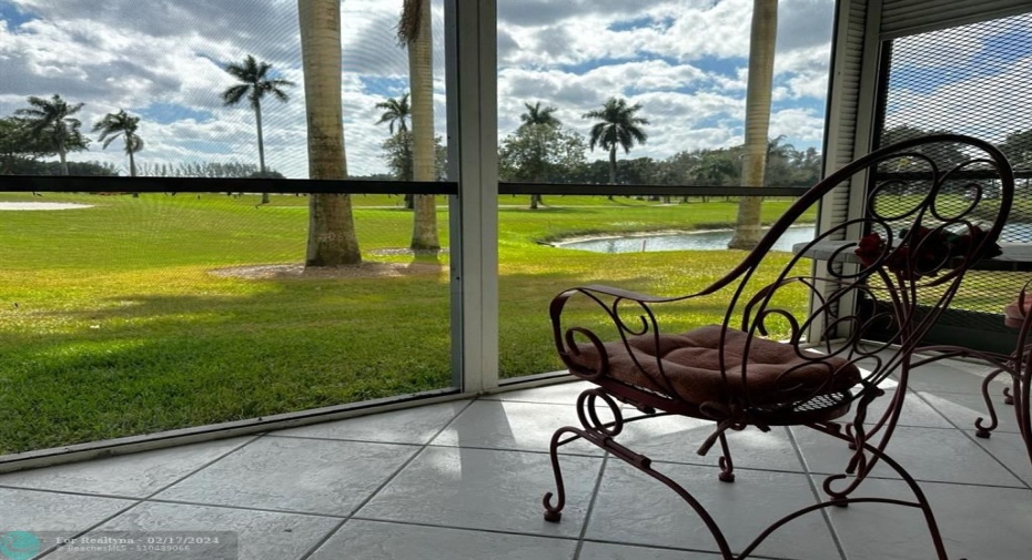 ENJOY COFFEE AND CHECK EMAILS ON YOUR SCREENED IN PATIO.