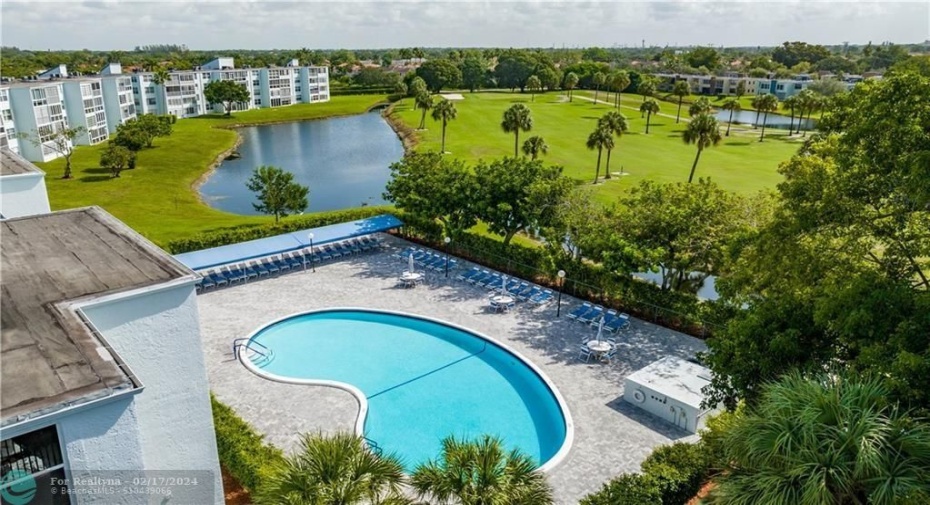 Best Building-ool & cabanas behind it