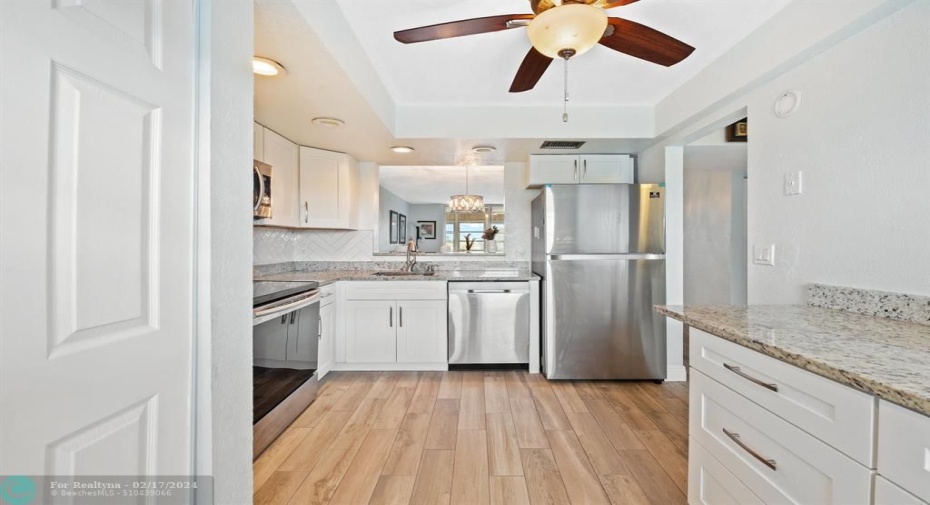 Shaker Cabinetry, Granite Counters & Tile Backsplash