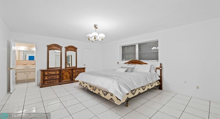 Primary bedroom with ensuite bathroom