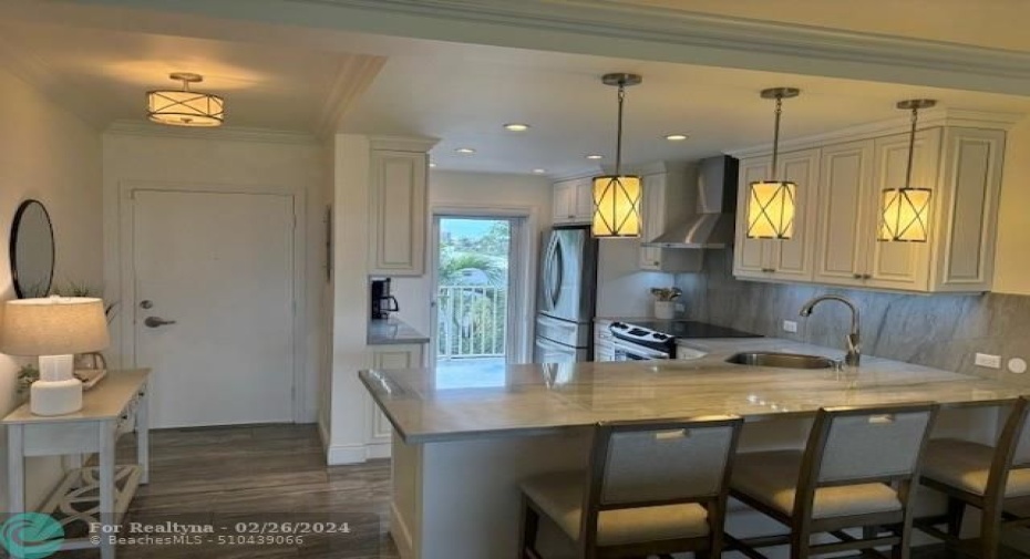 Front entry and kitchen