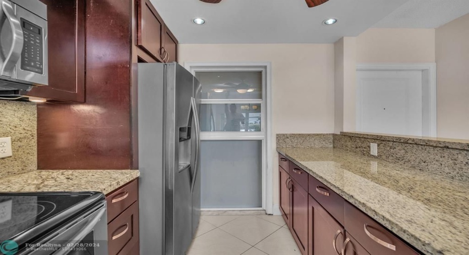 large kitchen windowall windows and doors are impact