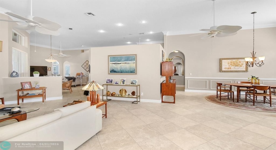 VIEW OF DINING AND FAMILY ROOM AREA FROM LIVING ROOM