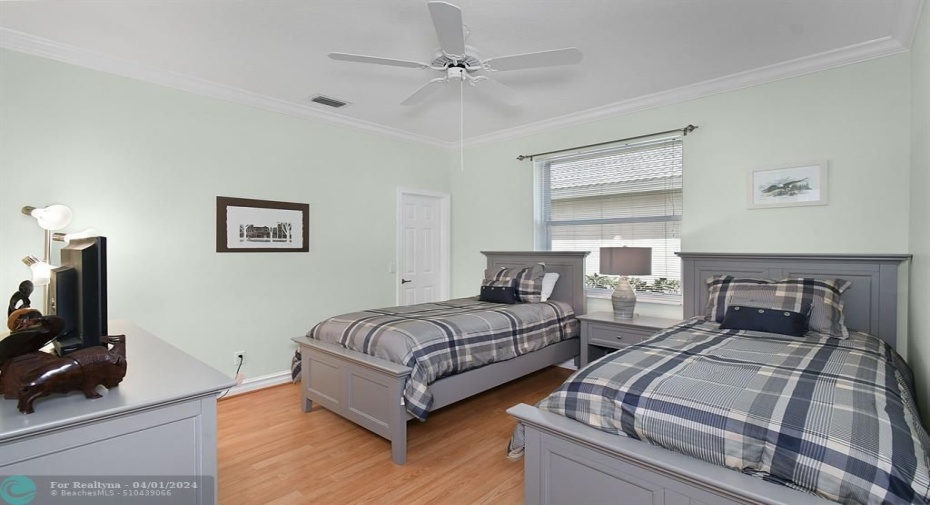 GUEST BEDROOM WITH SMALL WALK-IN CLOSET