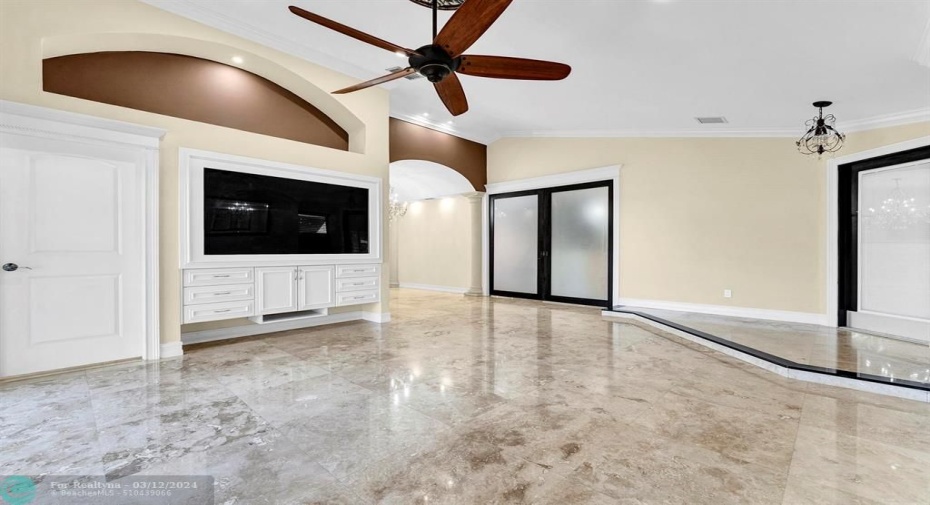 or Great room with built in entertainment center with 70in TV , that stays !!