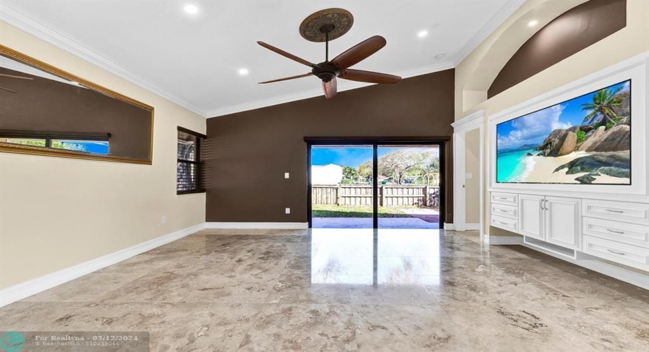 With Impact sliders leading to the pavered backyard & park