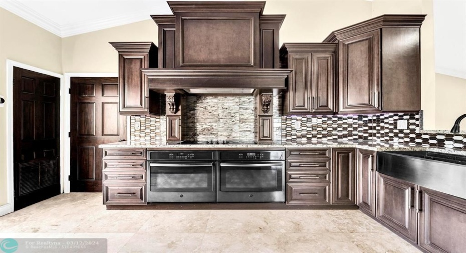 w/ double ovens , upgraded range hood, 2 spice racks