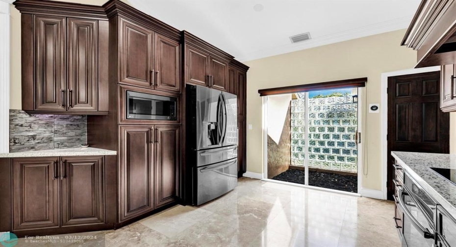 Ambient lighting under & above cabinets & Black SS appliances