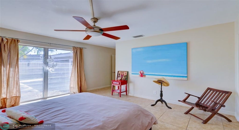 Large windows allow the gentle tropical breezes to fill the room.