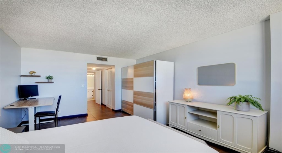 Two closets in the master bedroom
