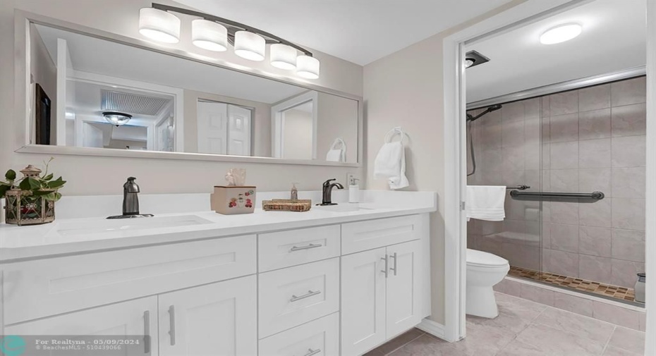 Guest-Remodeled with double sinks -quartz countertops