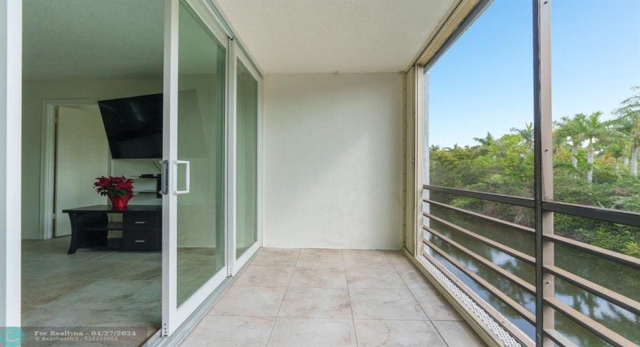 4-Piece Impact Sliding Doors w/Hurricane Shutters in Enclosed Patio