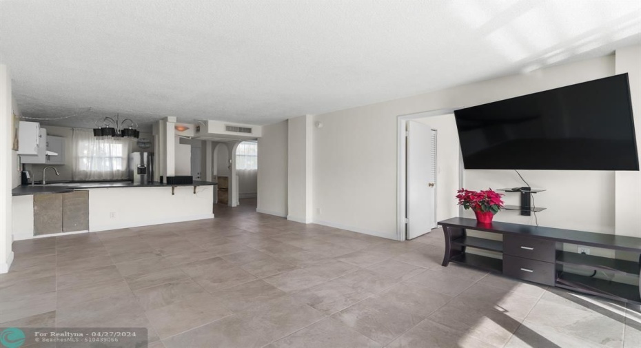 View of Living Area, Dining Area, and Kitchen