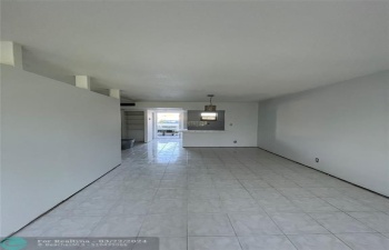 Living room toward Kitchen and Front door