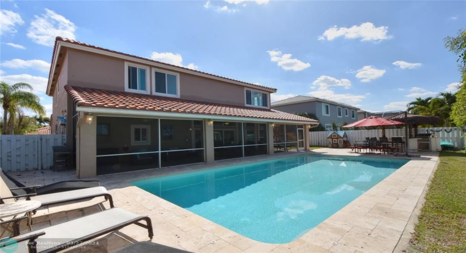 REAR VIEW WITH POOL AND SIDE YARD