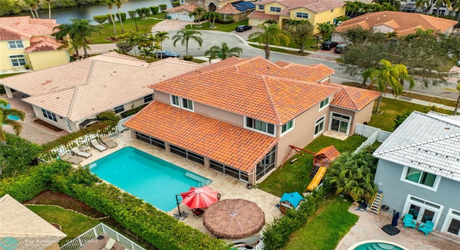 REAR VIEW WITH POOL AND SIDE YARD