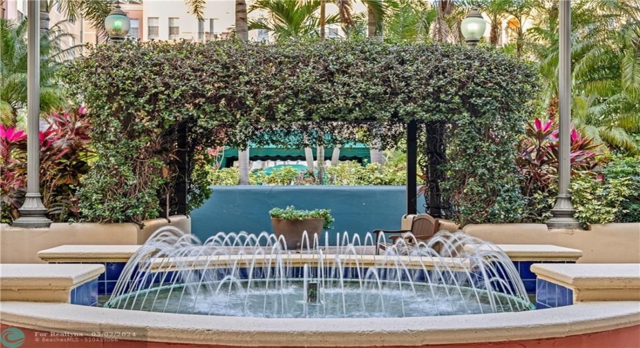 Gorgeous community spaces with seating, lush landscaping, water features & grills