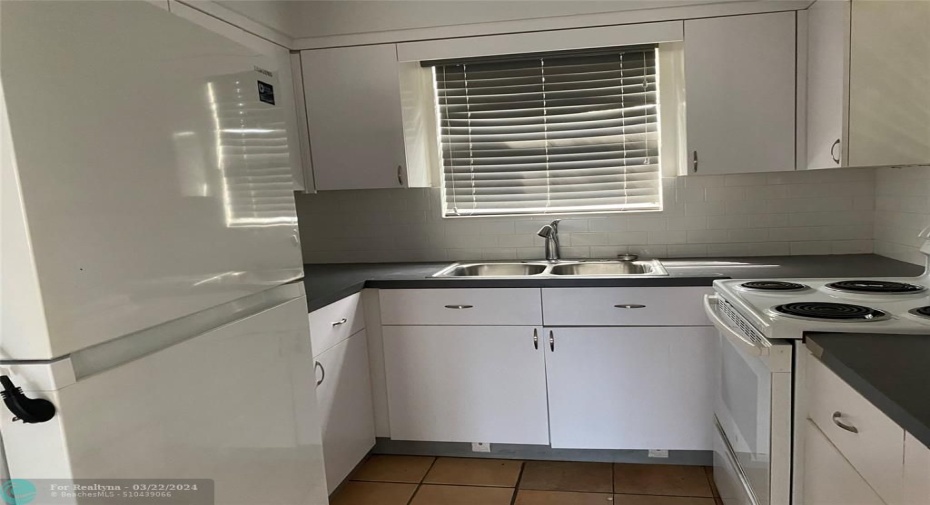 kitchen  has 2 windows  this window has a nice view