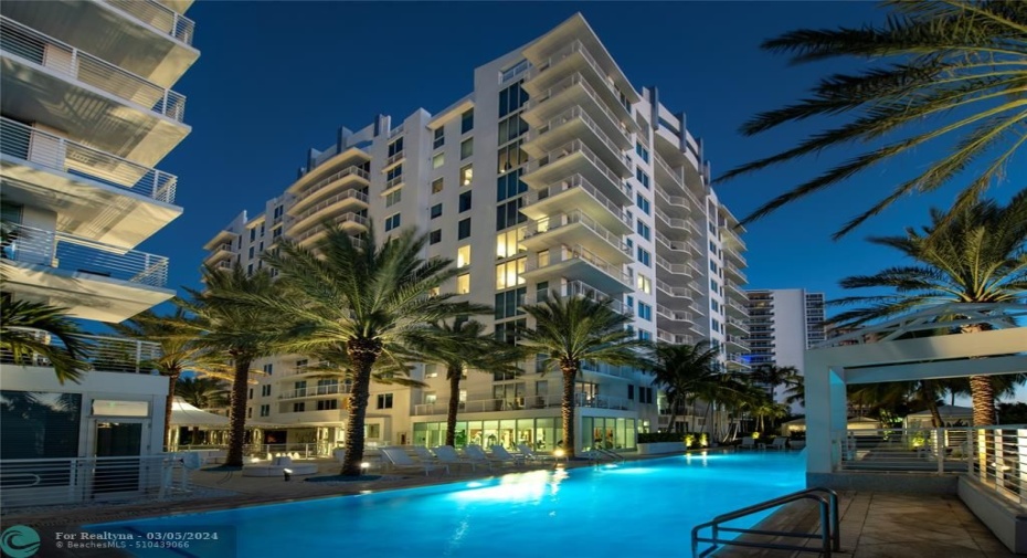 South building, gym is on the ground level overlooking the pool