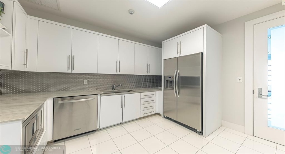 catering kitchen is between the club room and the conference room