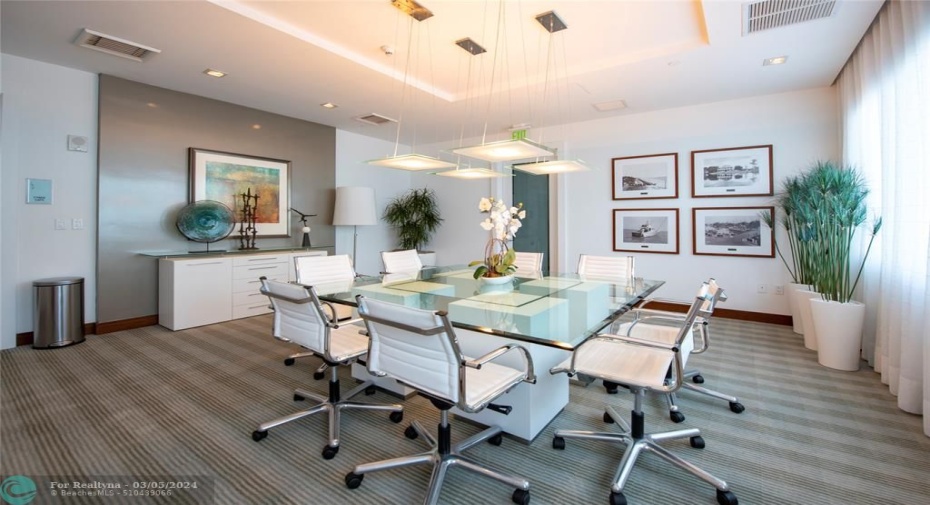 conference room with catering kitchen behind