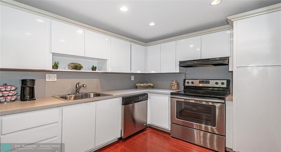 UPDATED KITCHEN.PLENTY ROOM FOR SMALL TABLE TWO CHAIRS ALSO. FOR THAT MORNING COFFFEE