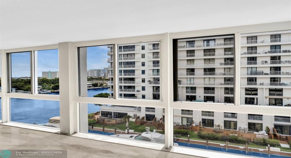 Floor to ceiling impact windows with water views.