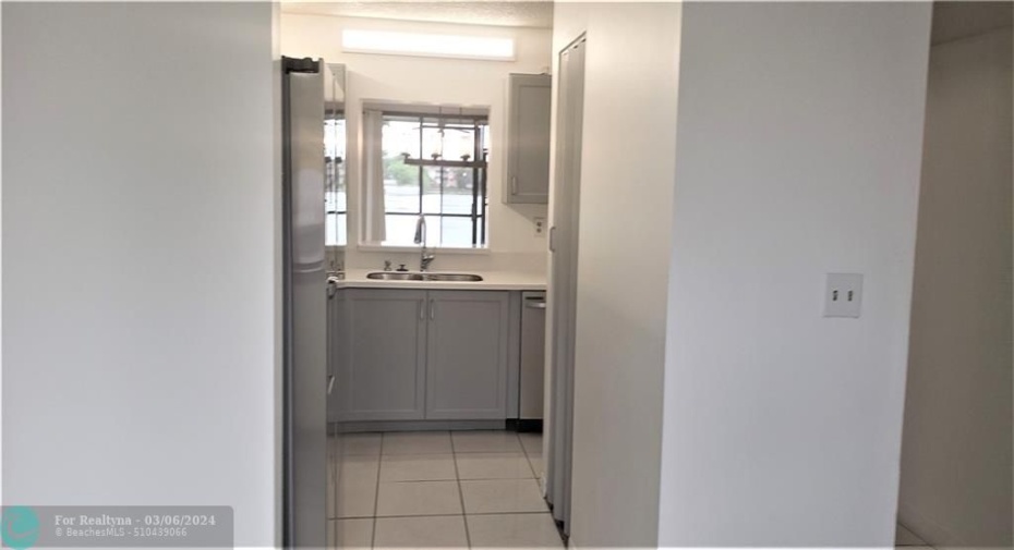 View from extra room to kitchen pass-thru
