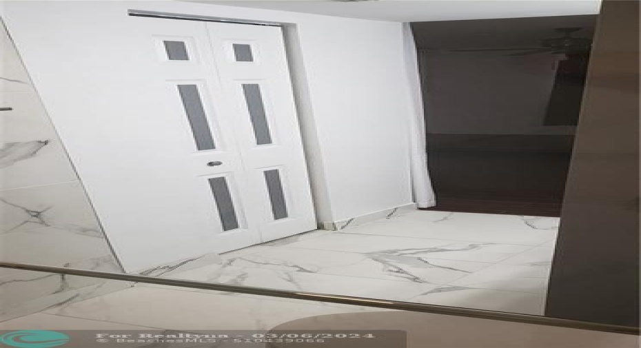 Door to walk-in closet