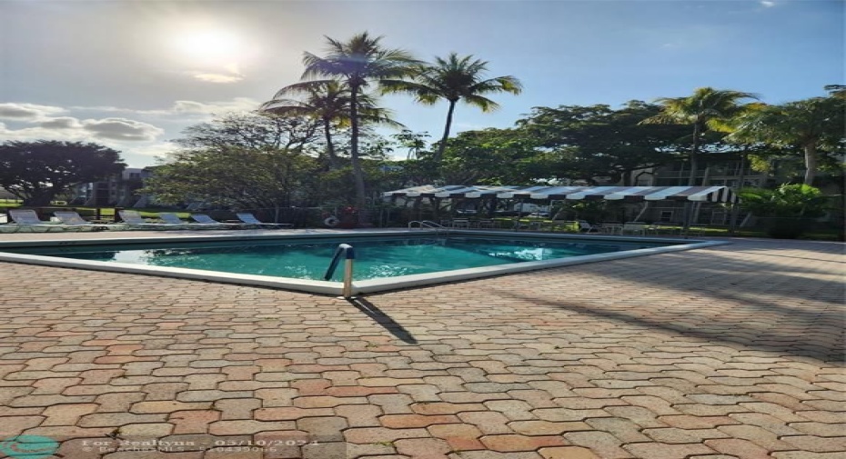 Satelite pool right behind condo