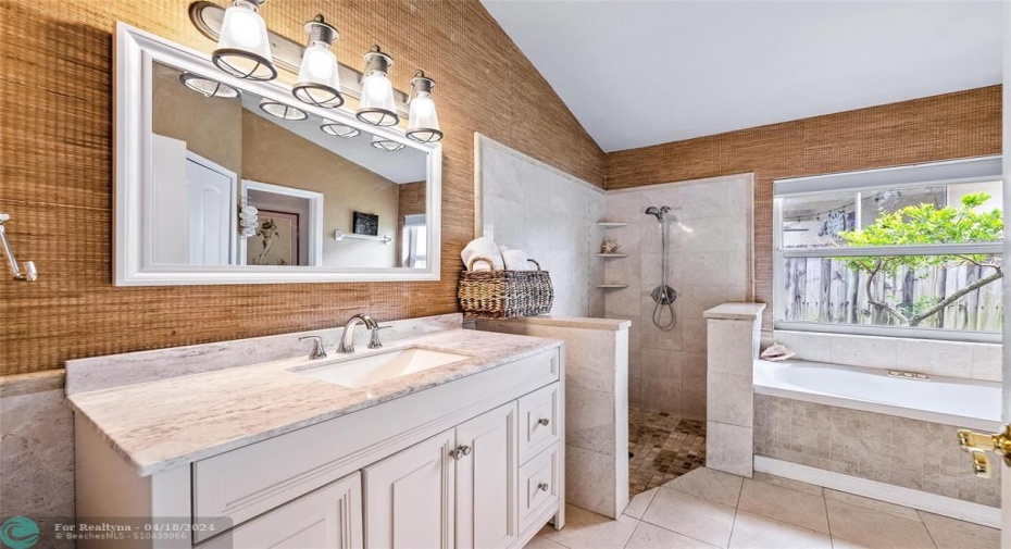 Master Bath with large vanity, separate shower and Jacuzzi style tub