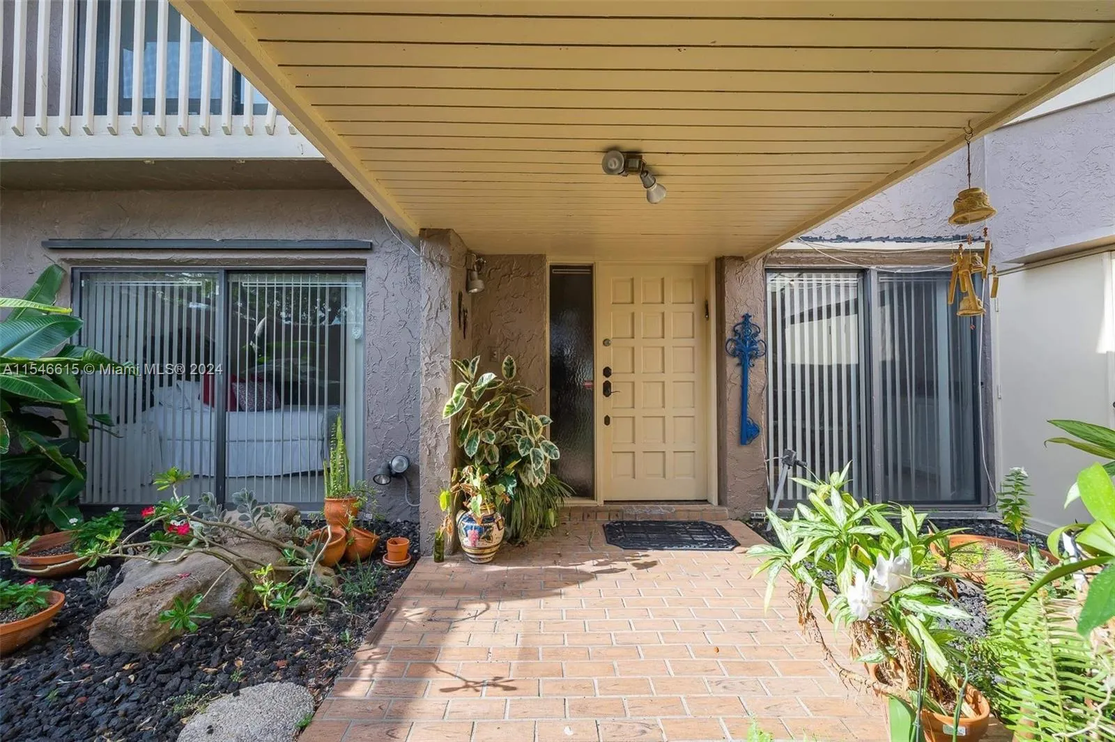 Courtyard entrance with two patio areas for your personal garden