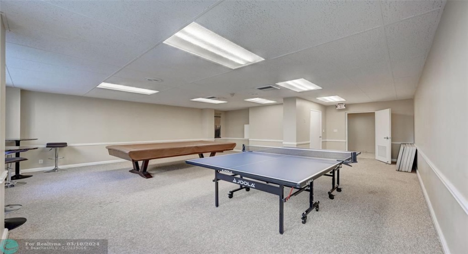 Game room with billiards and ping pong