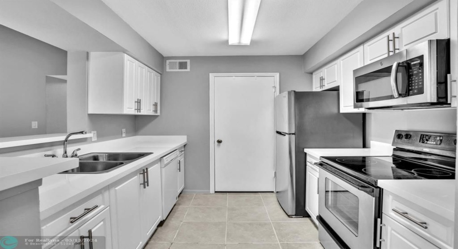 View of Kitchen and Pantry from Dining Area entrance
