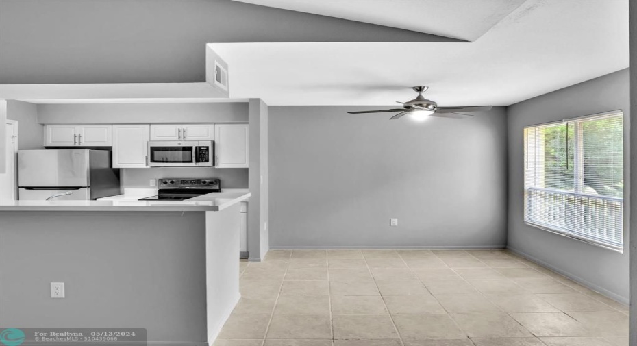 View of Kitchen and Dining Area from Living Area