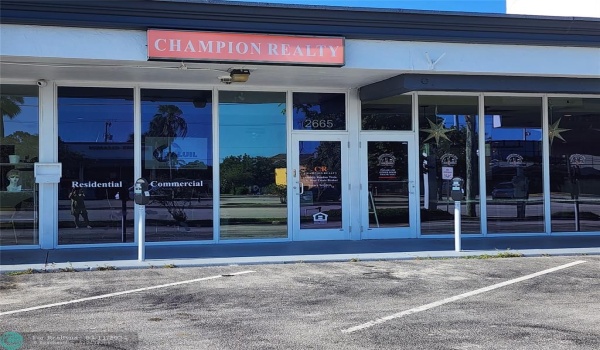 front entrance with customer parking