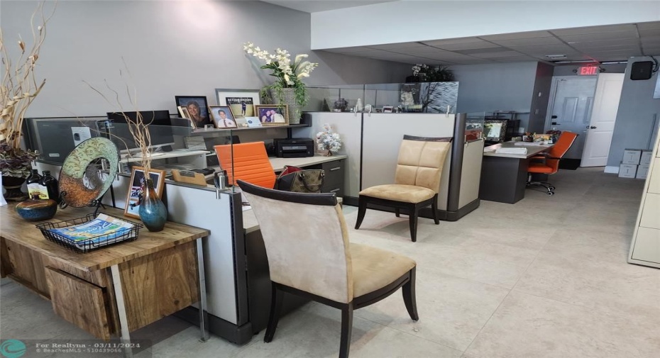 one of two office work spaces