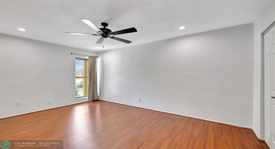 split bedrooms- br #2 laminate flooring high hats ceiling fan