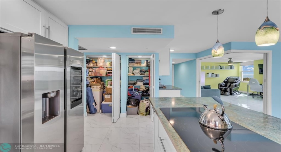 Pantry/Extra storage adjacent to kitchen-doors open
