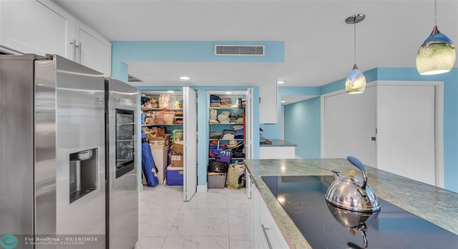 Another view of Pantry. 2nd bedroom/office door closed