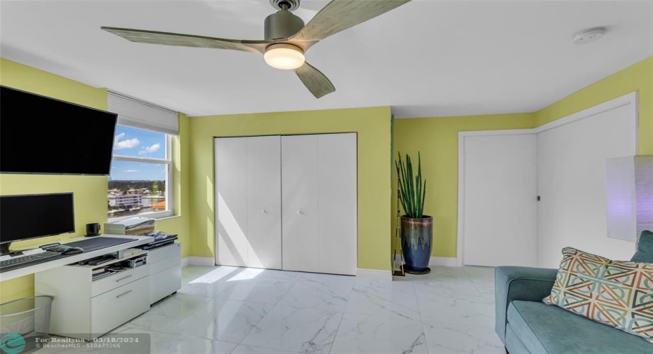 2nd bedroom redesigned as an office or for a guest. Cut out space can be closed for privacy