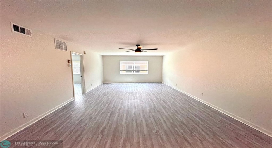 Large open area all new waterproof and soft laminate flooring throughout