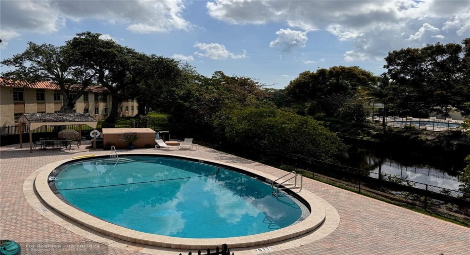 Great sunning deck with a heated pool