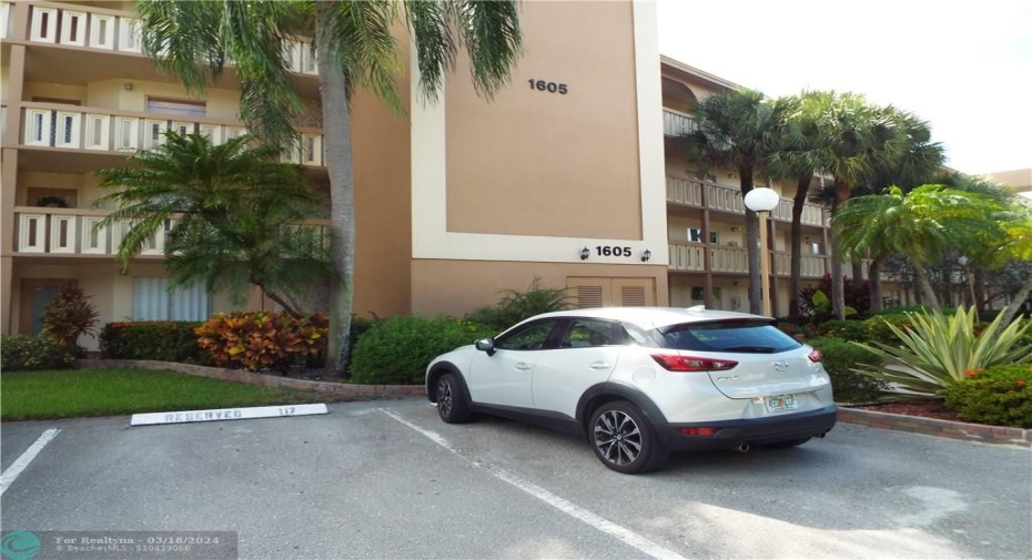 Parking space 117, in front of bldg