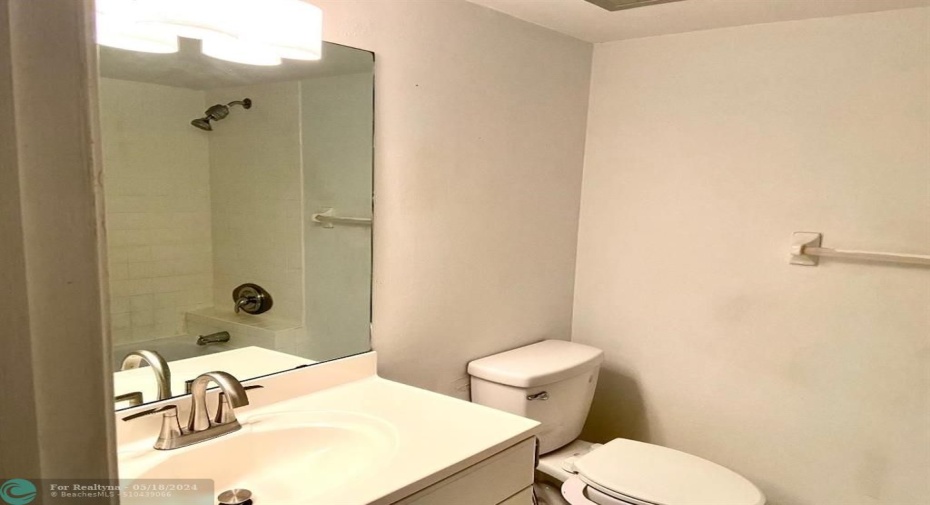 Primary bath with combination tub and shower