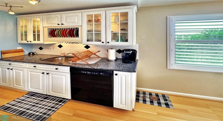 Granite Counter, Tile Backsplash & Stylish Light Fixture