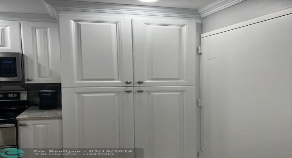 Washer and dryer neatly stored out of site