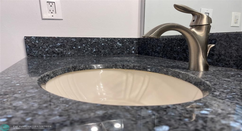 Ubatuba! Deep blue flakes in this beautiful granite counter
