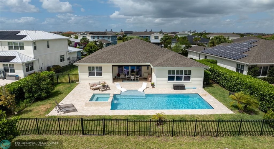 aerial view of back of home and yard