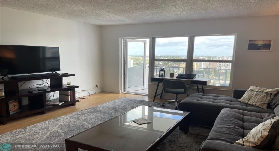 Spacious Living Room with door to Balcony